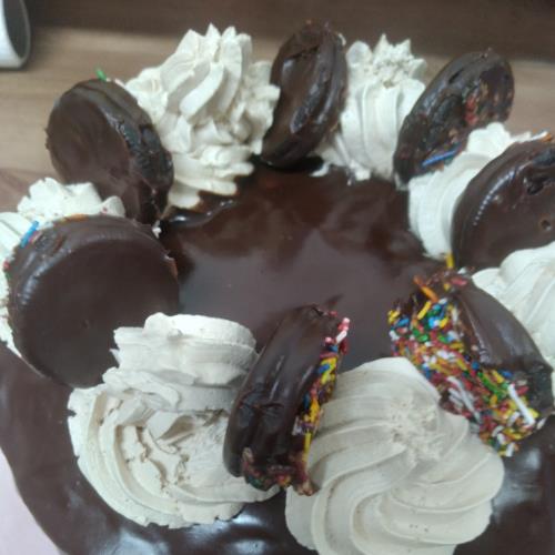 עוגת יום הולדת שוקוניל עם קרם בטעם קפה וגאנש שוקולד ... 